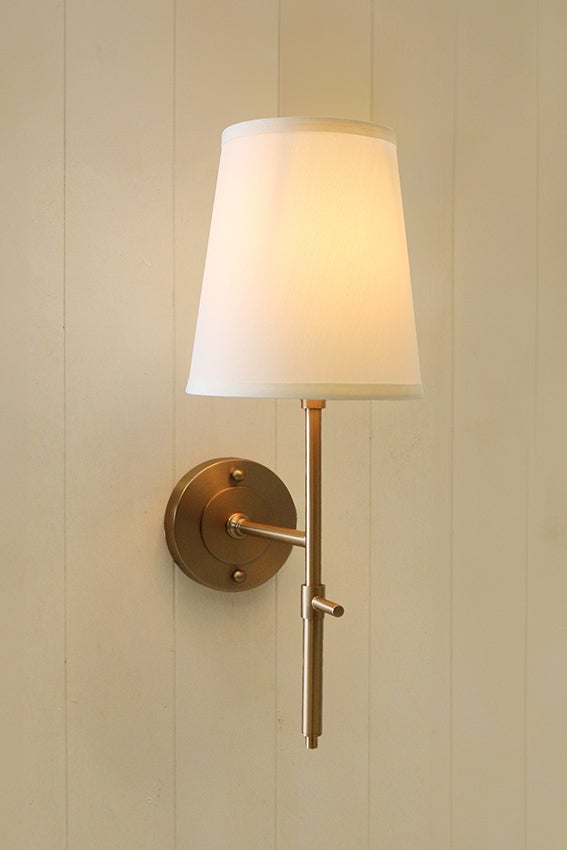 New York Wall Sconce in Antique Brass Finish