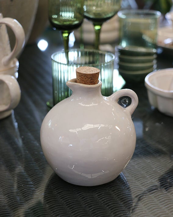 THE CREAMERY OIL POURER